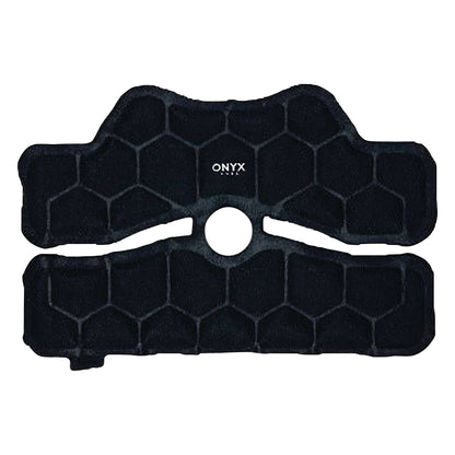 The Xena Therapies Onyx Cool Knee pad features a black hexagonal-patterned design with a central hole and is used for cooling therapy.