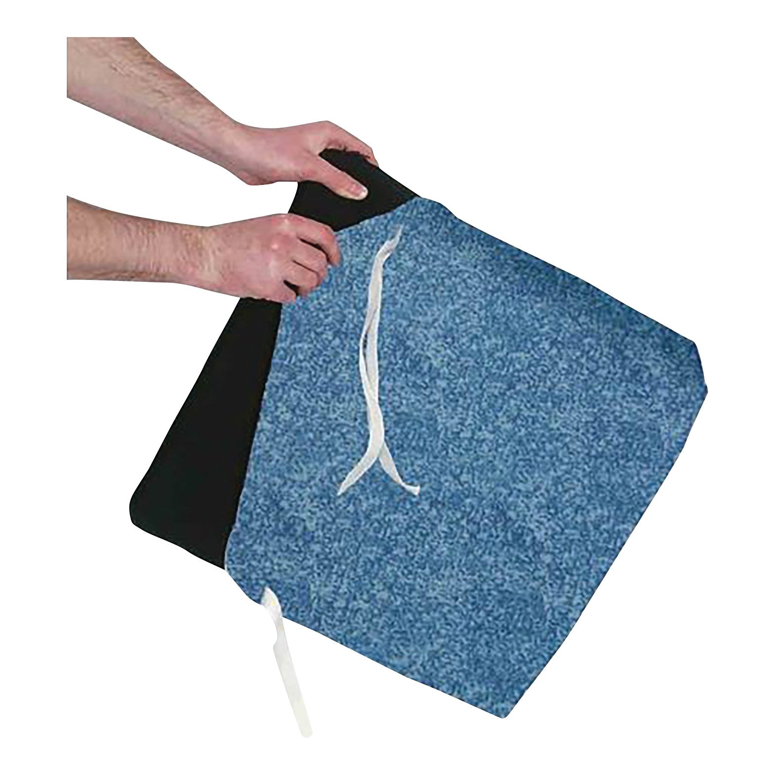 Hands holding the AliMed Coccyx Wheelchair Cushion with Checkerboard T-Gel Topper, featuring a blue cover with white ties.