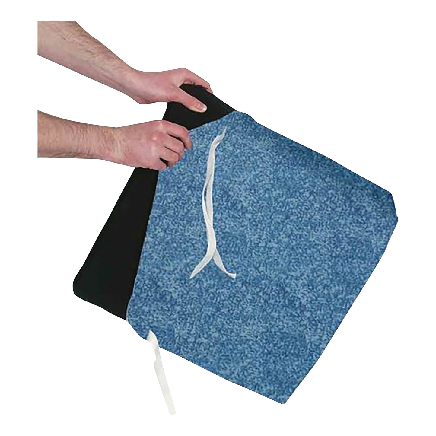 Hands holding the AliMed Coccyx Wheelchair Cushion with Checkerboard T-Gel Topper, featuring a blue cover with white ties.