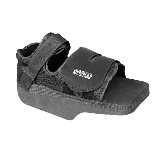 A black DARCO OrthoWedge Shoe with Velcro straps, designed to offload pressure from the forefoot, featuring a wedge-shaped sole.
