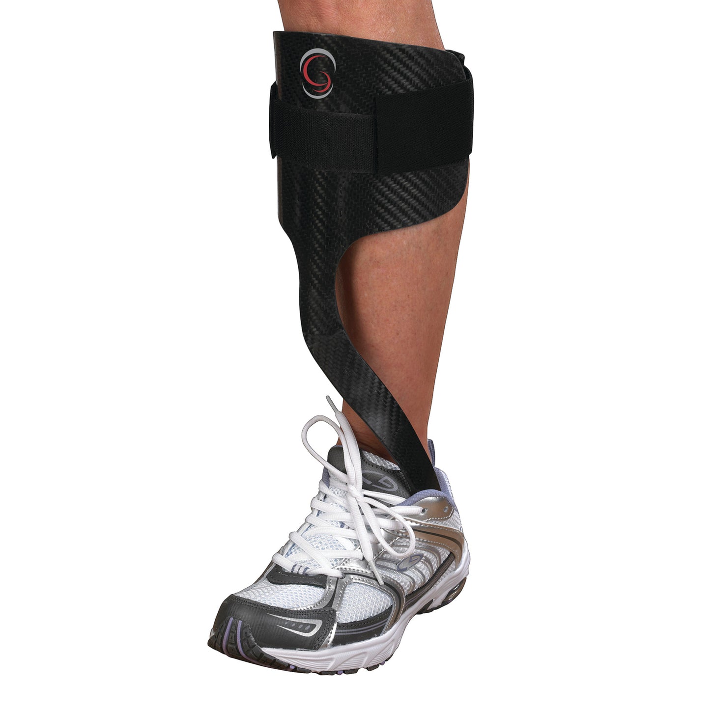A leg wearing the Elite AFO Rehabilitator, a black carbon fiber brace, with a white sneaker for support and mobility.