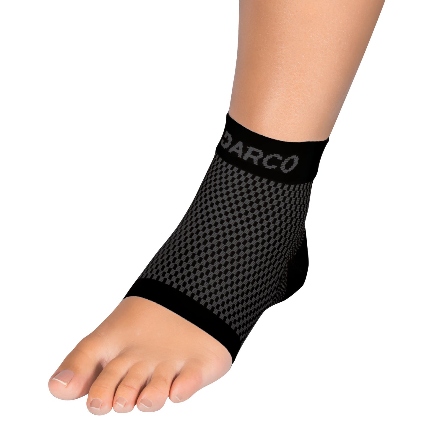 The DARCO DCS Plantar Fasciitis Sleeve is worn on a foot, featuring a black checkered pattern and designed for arch support.