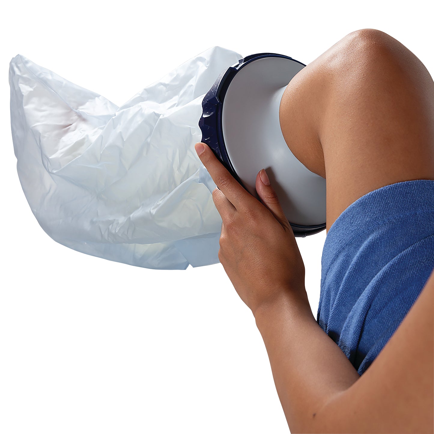 A person uses the Brownmed SEAL-TIGHT Infinity Cast Protector on their bent knee, covering it with a waterproof, flexible bag.