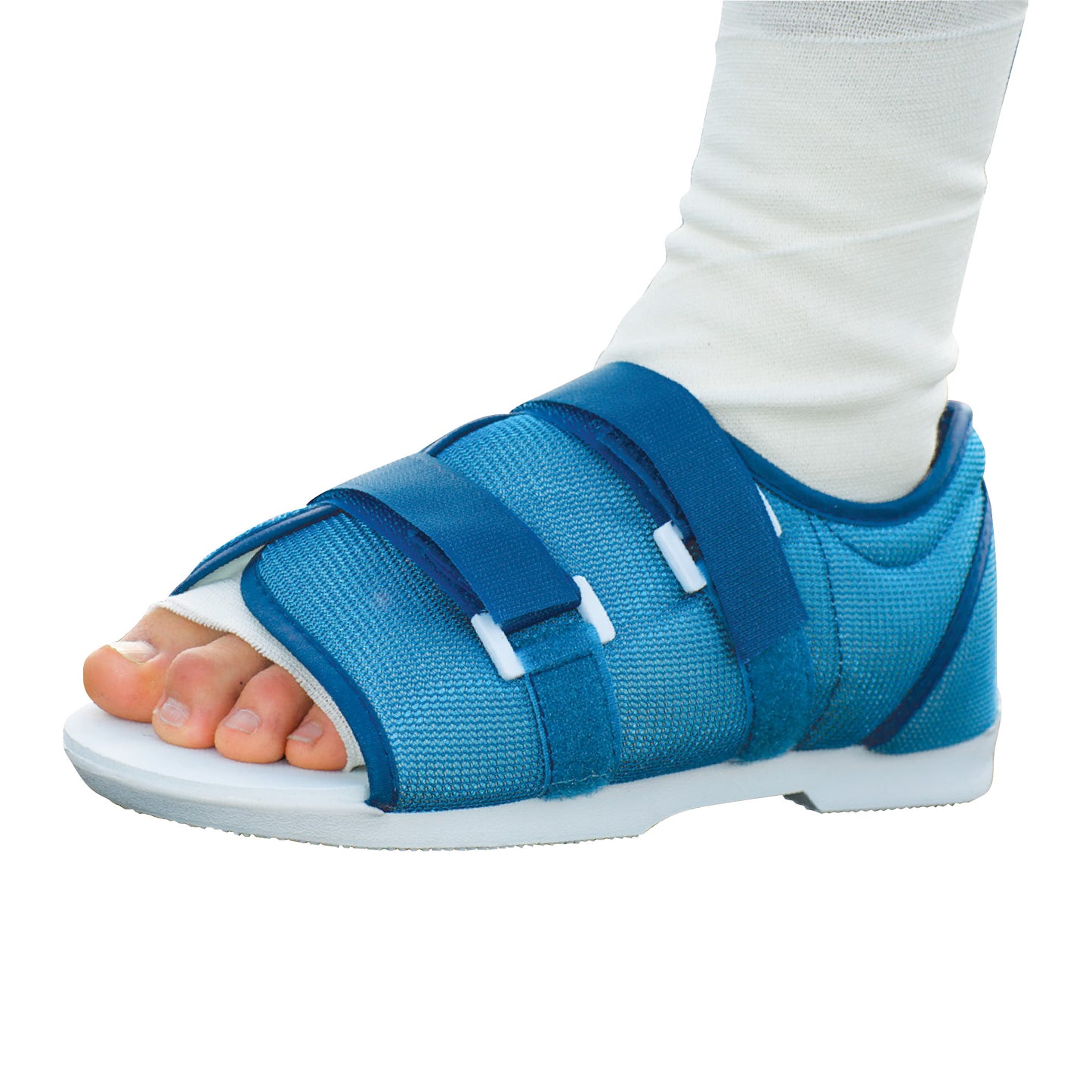 A foot wearing the DARCO Original MedSurg Shoe, a blue open-toe post-op shoe with adjustable straps and a white sock.