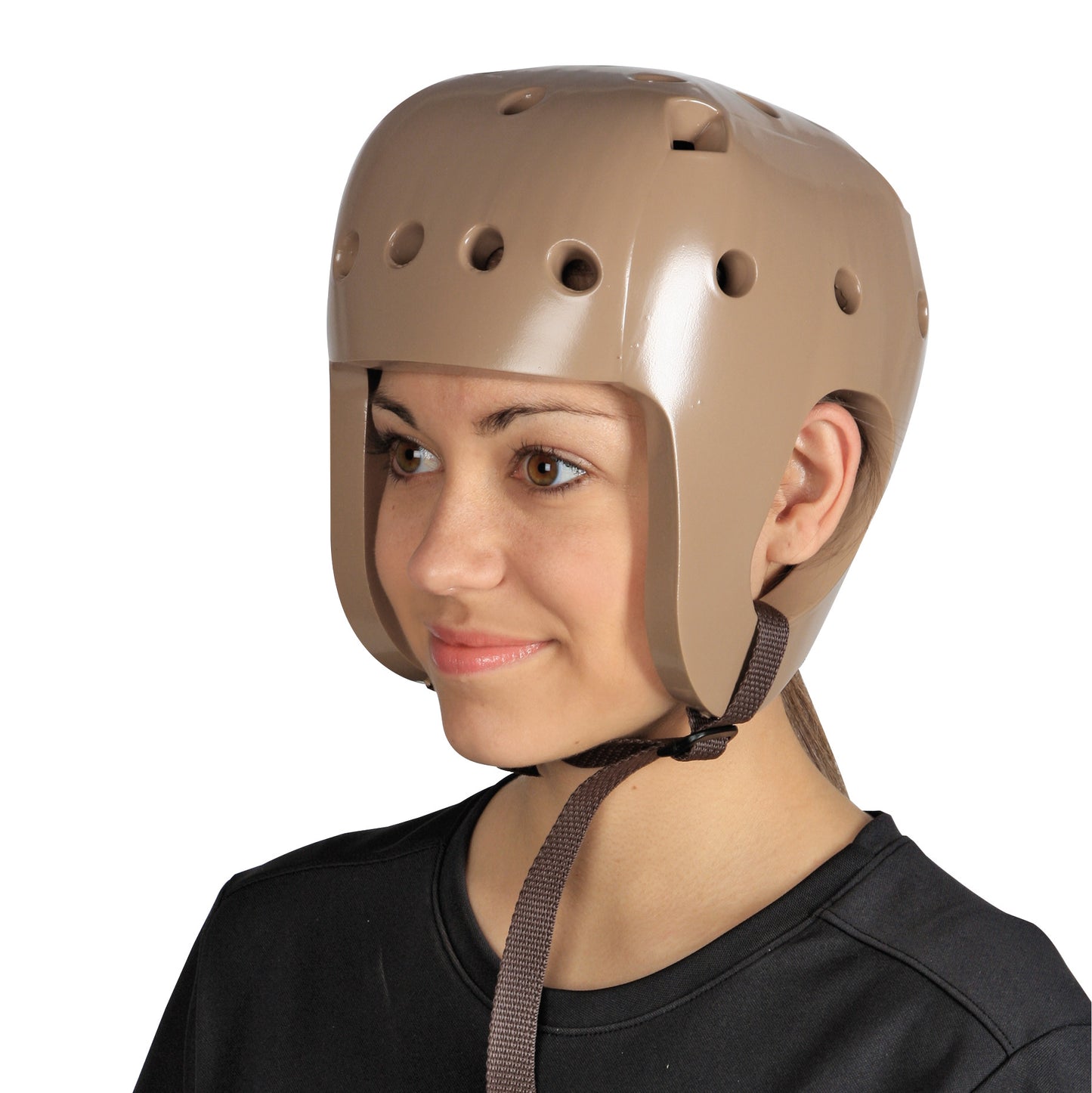 A person wearing a Danmar Products Full-Coverage Helmet, which is beige with ventilation holes and a chin strap.