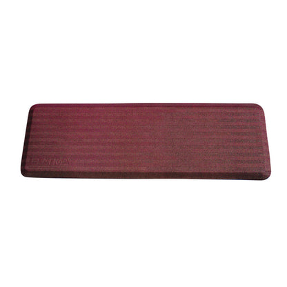 FLATMAT Bedside Fall Mat with a maroon color and textured surface, designed for placement alongside a bed to prevent falls.
