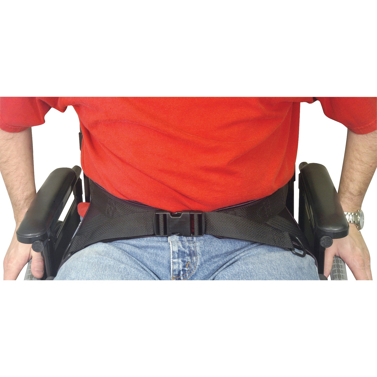 A person sits in a wheelchair wearing a Therafin Hip Stabilizing Belt, fastened over a red shirt and blue jeans.