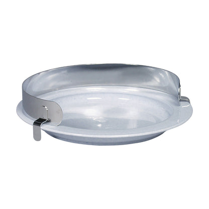 Stainless Plate Guard attached to a white plate, designed to help prevent spills by creating a barrier around the edge.