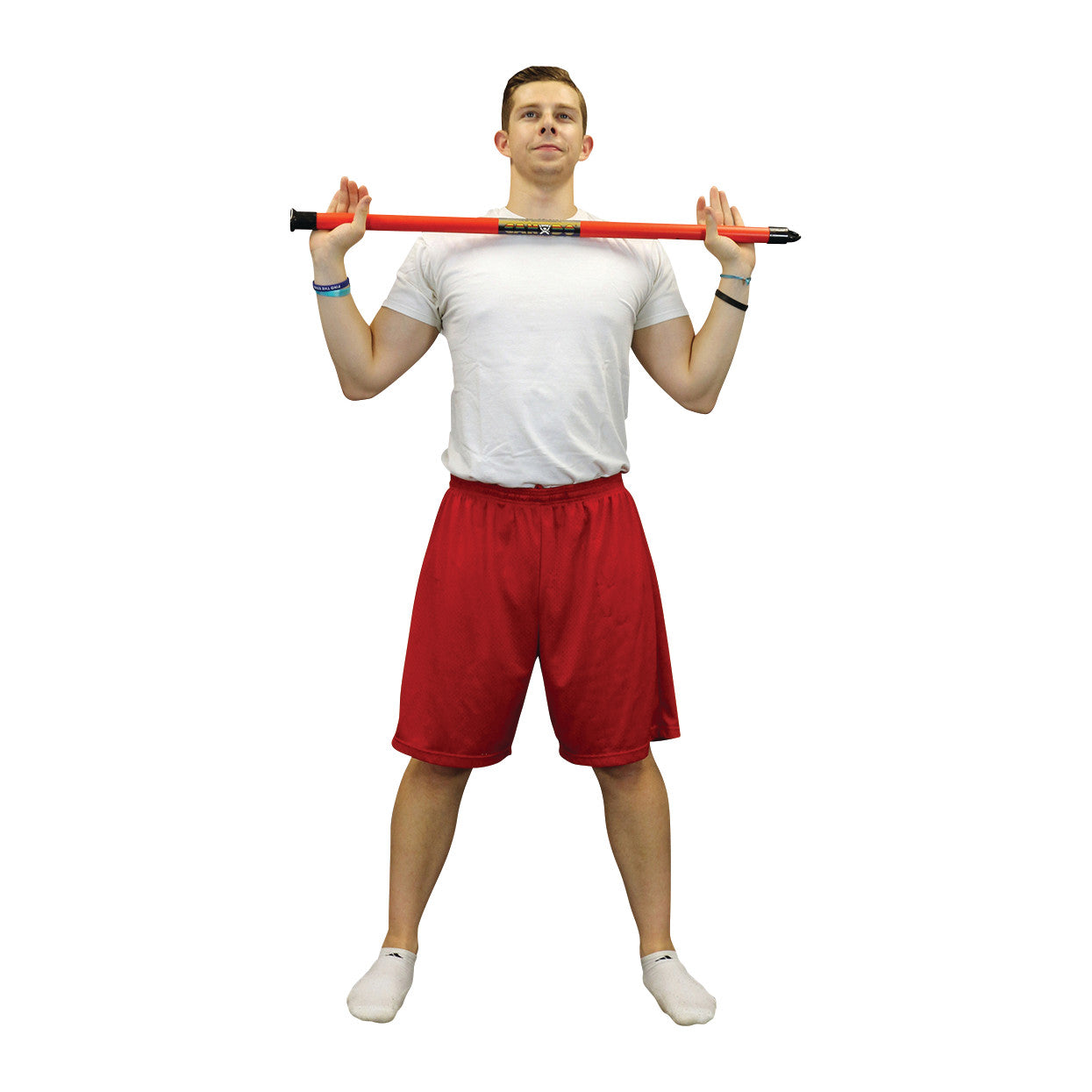 A person holds a red CanDo WaTE Bar across their shoulders. They are wearing a white shirt, red shorts, and white socks.