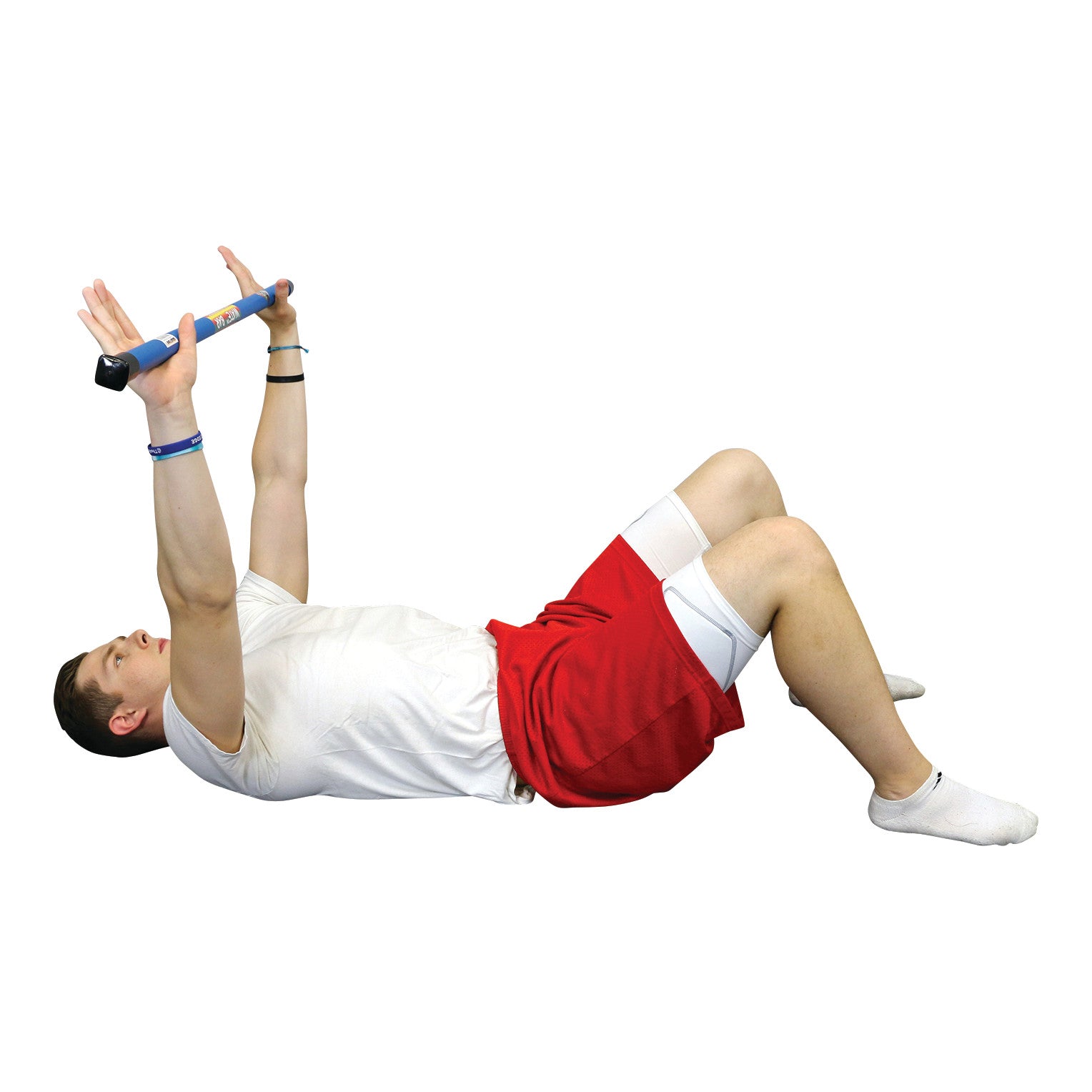 A person lies on their back, holding a CanDo WaTE Bar with both hands, knees bent, wearing a white shirt and red shorts.
