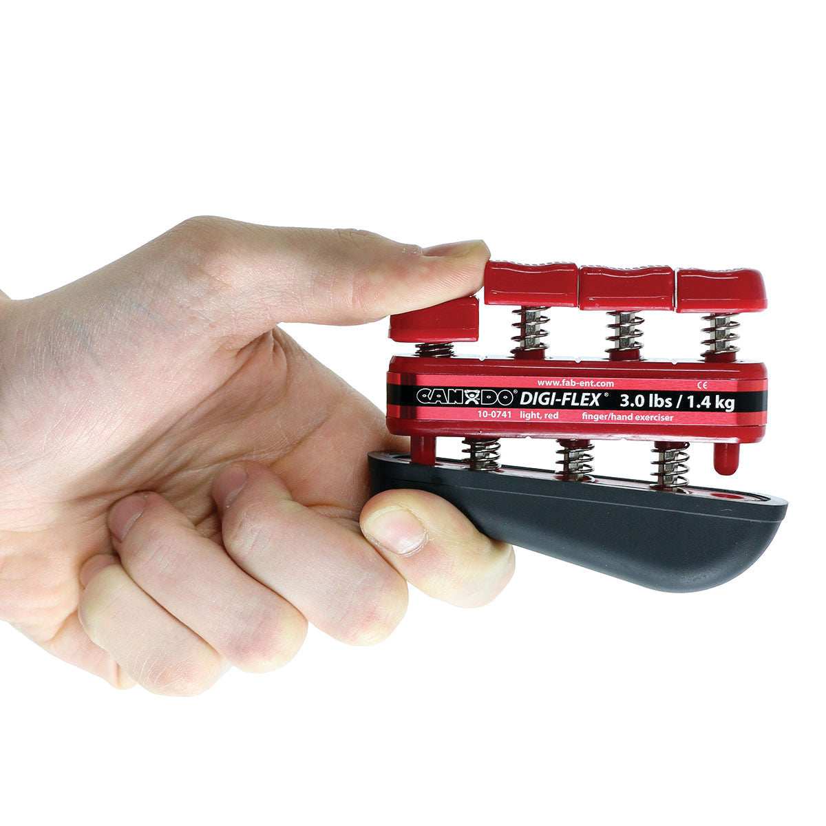 A hand grips a red CanDo Digi-Flex Hand Exerciser with three silver springs, designed for finger and hand strength training.
