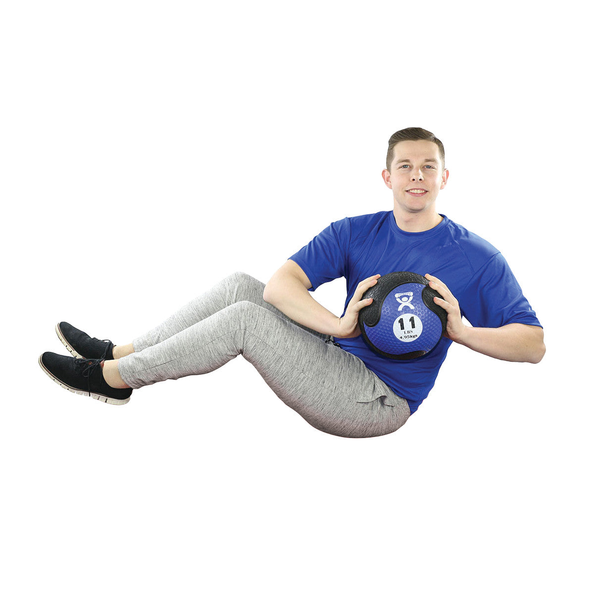A person holds a CanDo Rubber Medicine Ball while performing an exercise. The ball is labeled with "11" for weight.