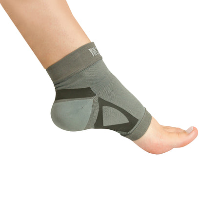 A foot wearing part of the Nice Stretch Total Solution PF Kit, a supportive compression sleeve for plantar fasciitis relief.