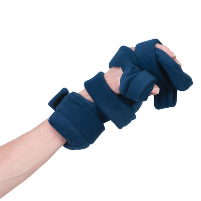 A person's arm is fitted with the Comfy Splints Adult Progressive Resting Hand Orthosis, designed for therapeutic hand positioning.