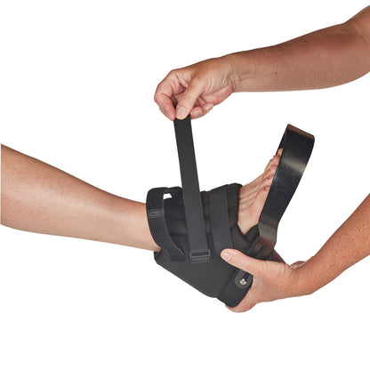 Person adjusting an AliMed Open Forefoot Orthosis, fastening strap around a foot with their hands.