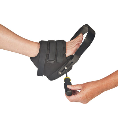 A foot is secured in an AliMed Open Forefoot Orthosis, and a person's hand is adjusting it with a screwdriver.