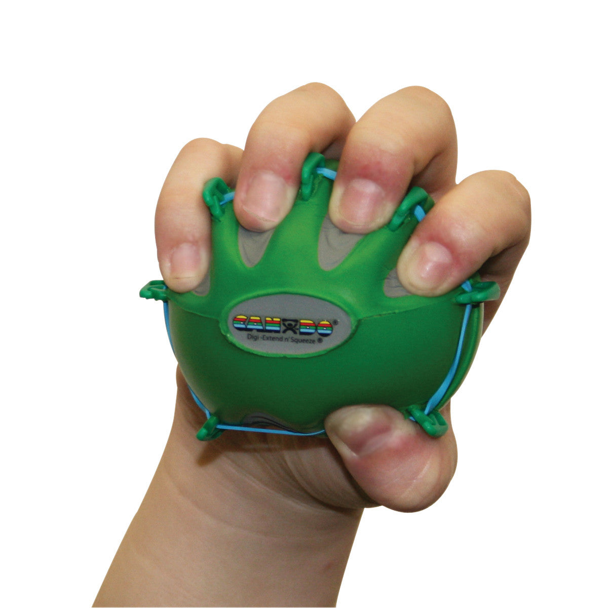 A child squeezes a green CanDo Digi-Extend n' Squeeze Hand Exerciser, designed with small loops for each finger for resistance training.