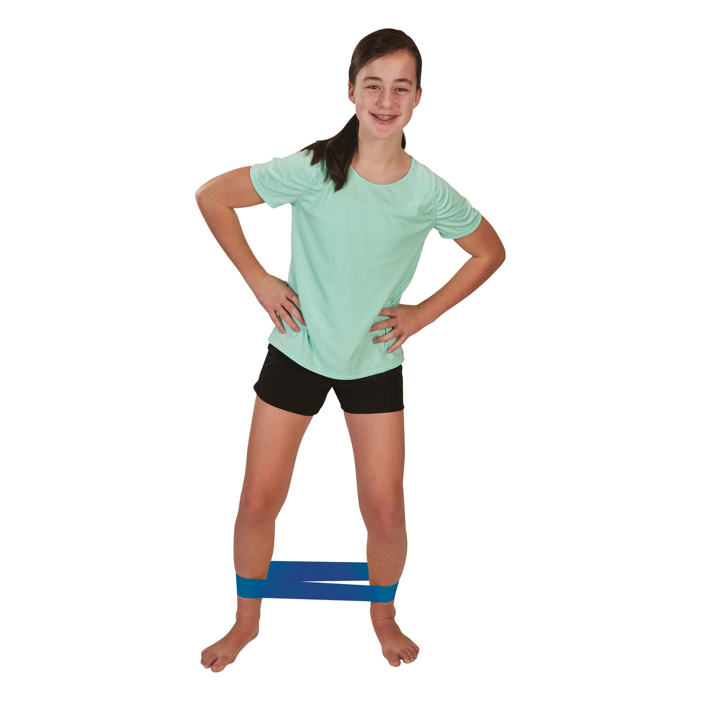 A young girl wearing a teal shirt and black shorts exercises with a blue CanDo Band Exercise Loop around her legs.