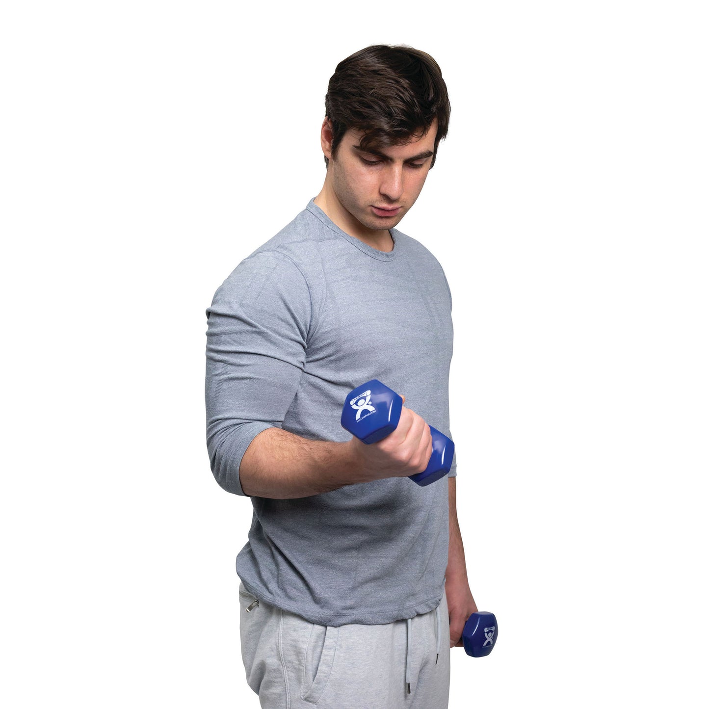 A man in a gray shirt and sweatpants lifts a blue CanDo Vinyl-Coated Dumbbell in each hand against a white background.