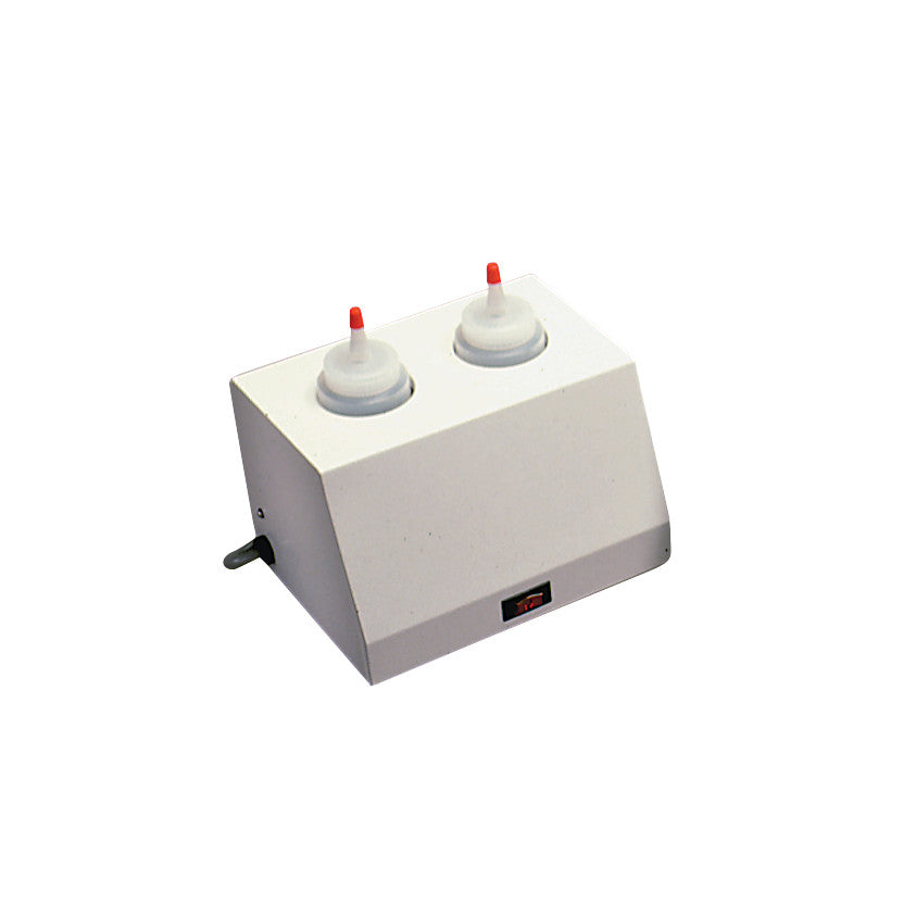 The Ideal Lotion and Gel Warmer is a white appliance with two bottle warmers, featuring red-tipped caps for dispensing.