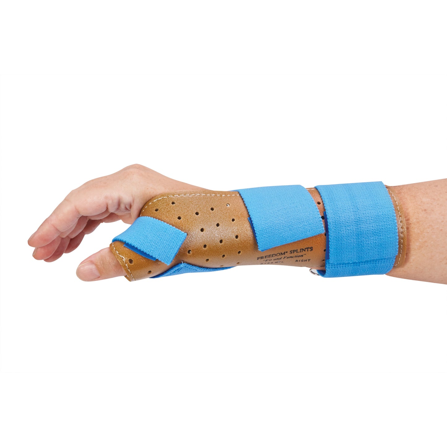 A hand wearing an AliMed FREEDOM Thumb Spica with a perforated tan brace and blue straps for thumb and wrist support.