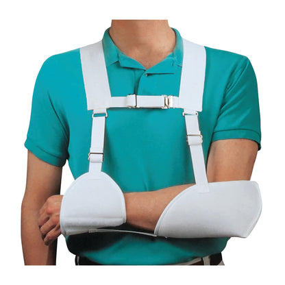 A person wears a Harris Hemi-Arm Sling over a turquoise polo shirt to support an injured arm, with white straps across the chest.