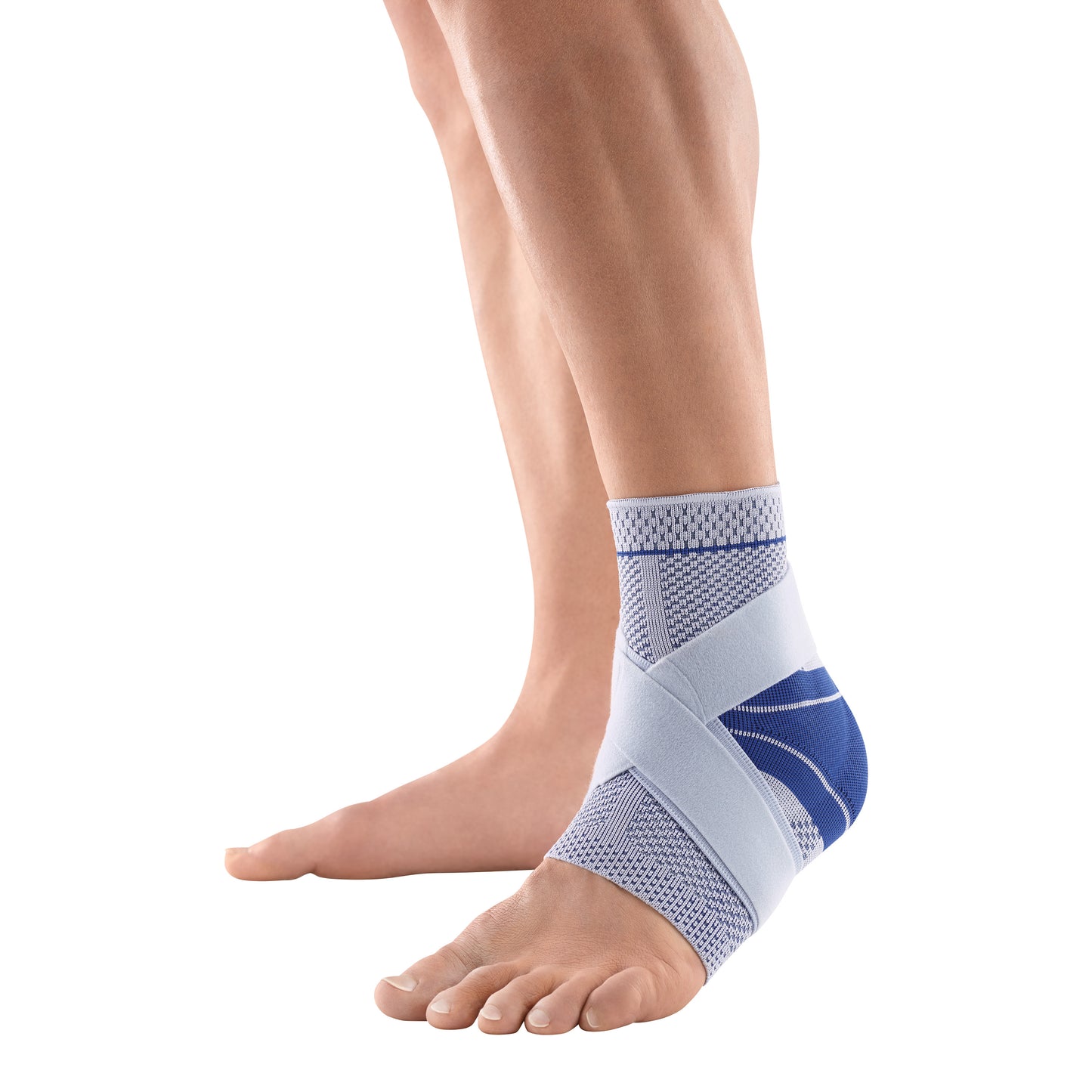 An ankle is supported by the Bauerfeind MalleoTrain Plus Ankle Support, featuring blue and grey compression fabric and straps.