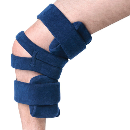 A leg wearing the Comfy Splints Adult Goniometer Knee Orthosis, featuring blue padded straps for support and alignment.