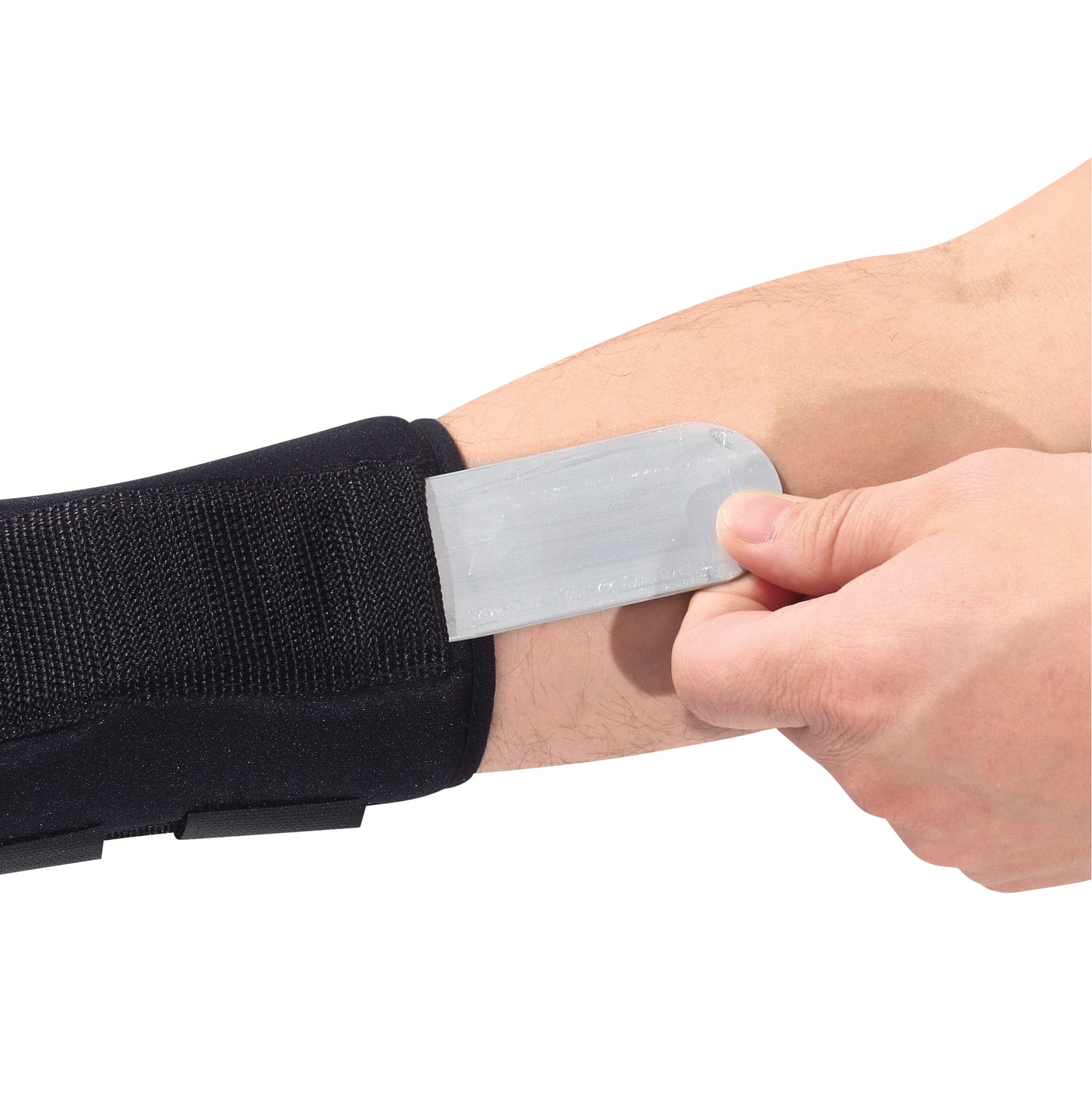A person adjusts an AliMed FREEDOM Comfort Wrist Support on their arm, inserting a metal splint for added stability.