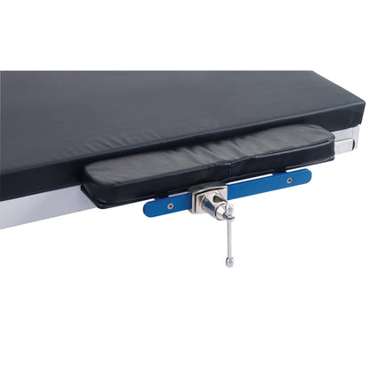 AliMed FREEDOM O.R. Table Width Extender with Pad attached to a table, featuring a cushioned black pad and blue adjustment bars.
