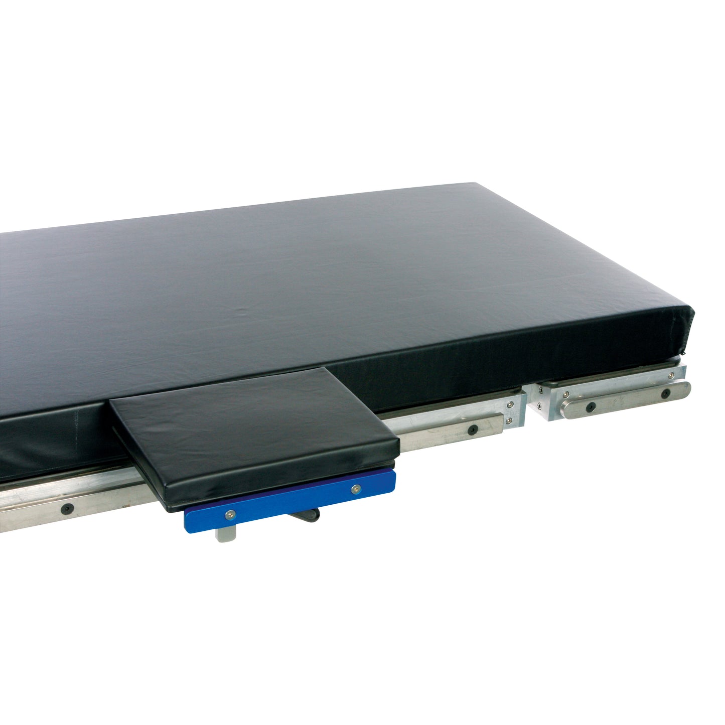 AliMed Table Width Extender with a padded surface attached to a table, secured by a blue sliding mechanism and metal brackets.