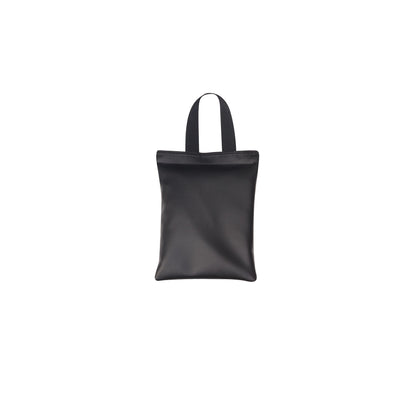 The AliMed MR-Safe Cervical/Traction Sandbag is black, rectangular, and features a handle at the top for easy carrying.