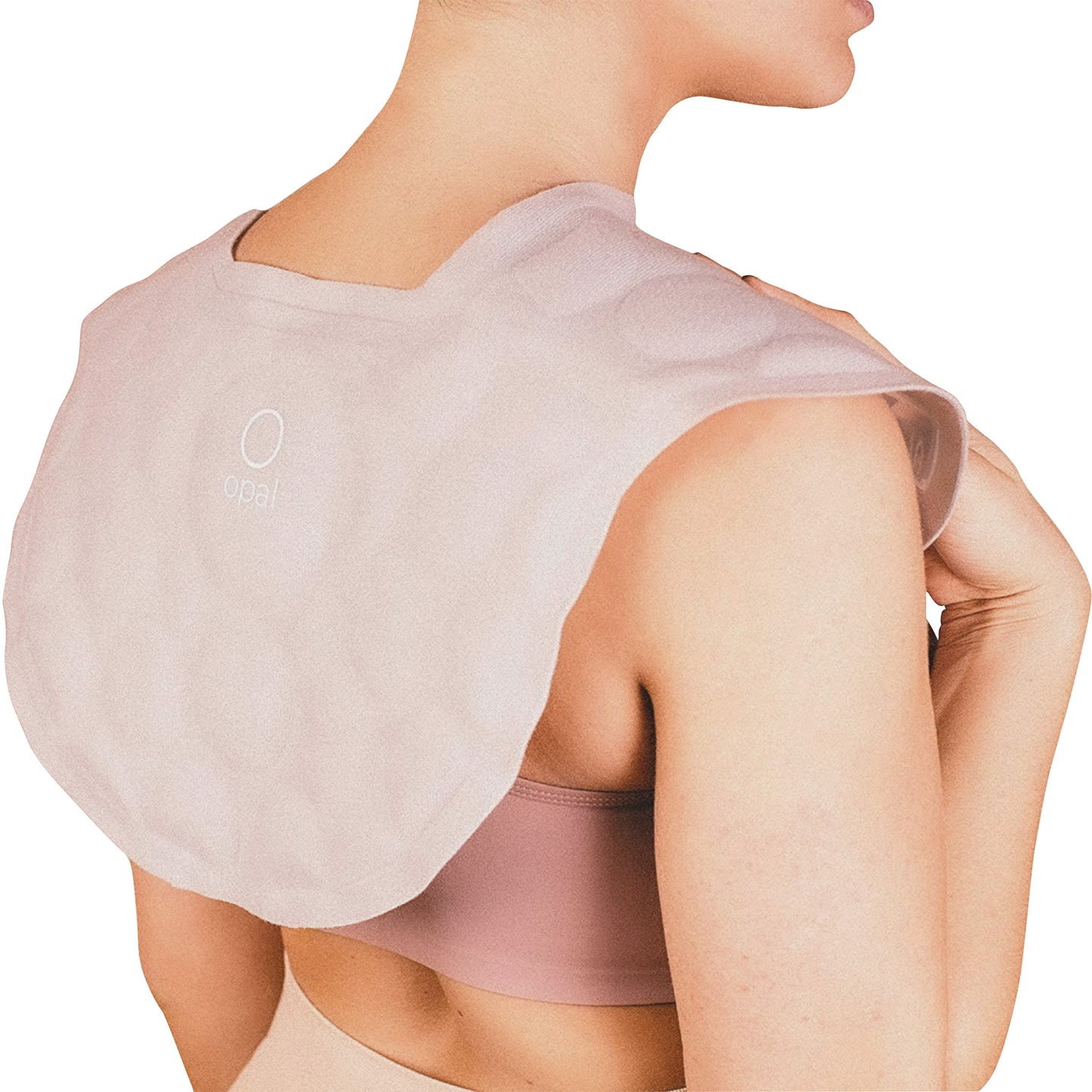 A person wearing a Xena Therapies Opal Cool Wrap on their shoulders over a pink sports bra, with the brand logo visible on the wrap.