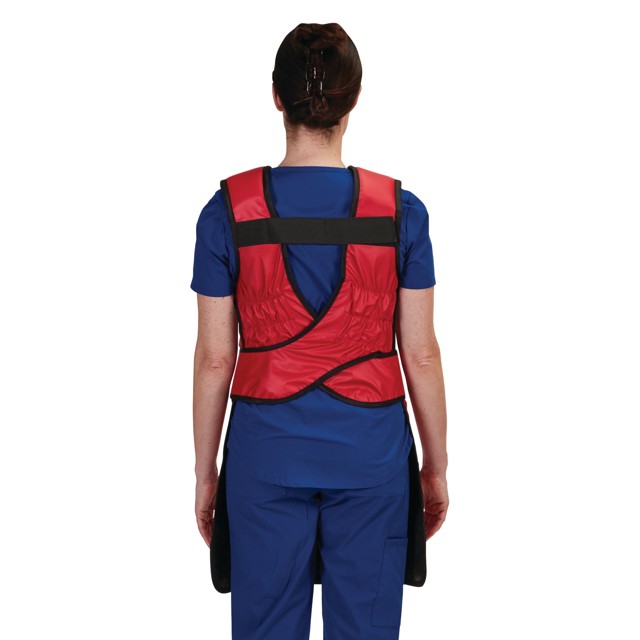 The back view of an AliMed Grab n Go Flex Weight Reliever Apron, Female, in red and black on a person in blue scrubs.