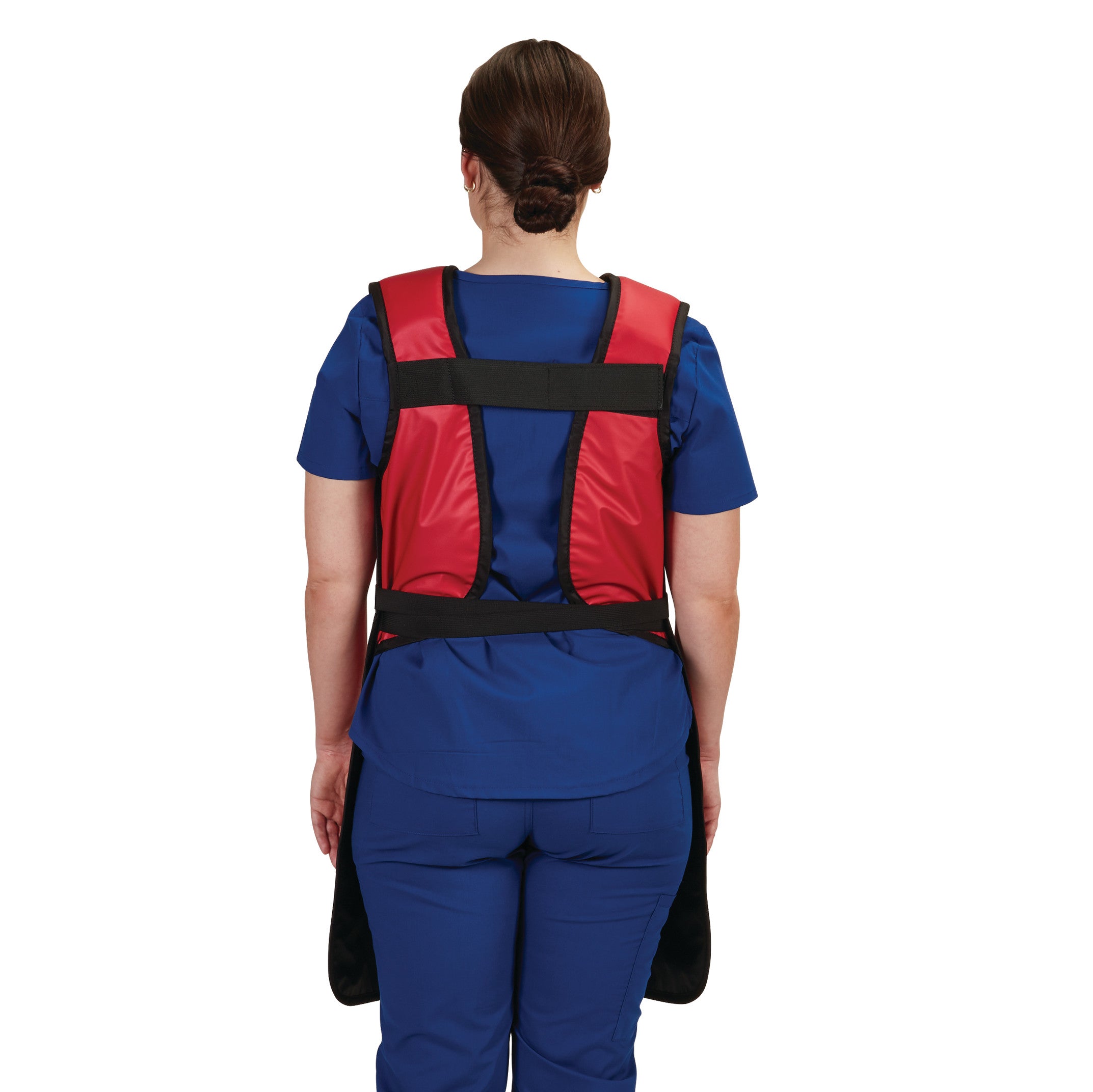 A person wearing an AliMed Grab n Go Tie Apron, Female. The apron is red with black straps and ties, over blue scrubs.