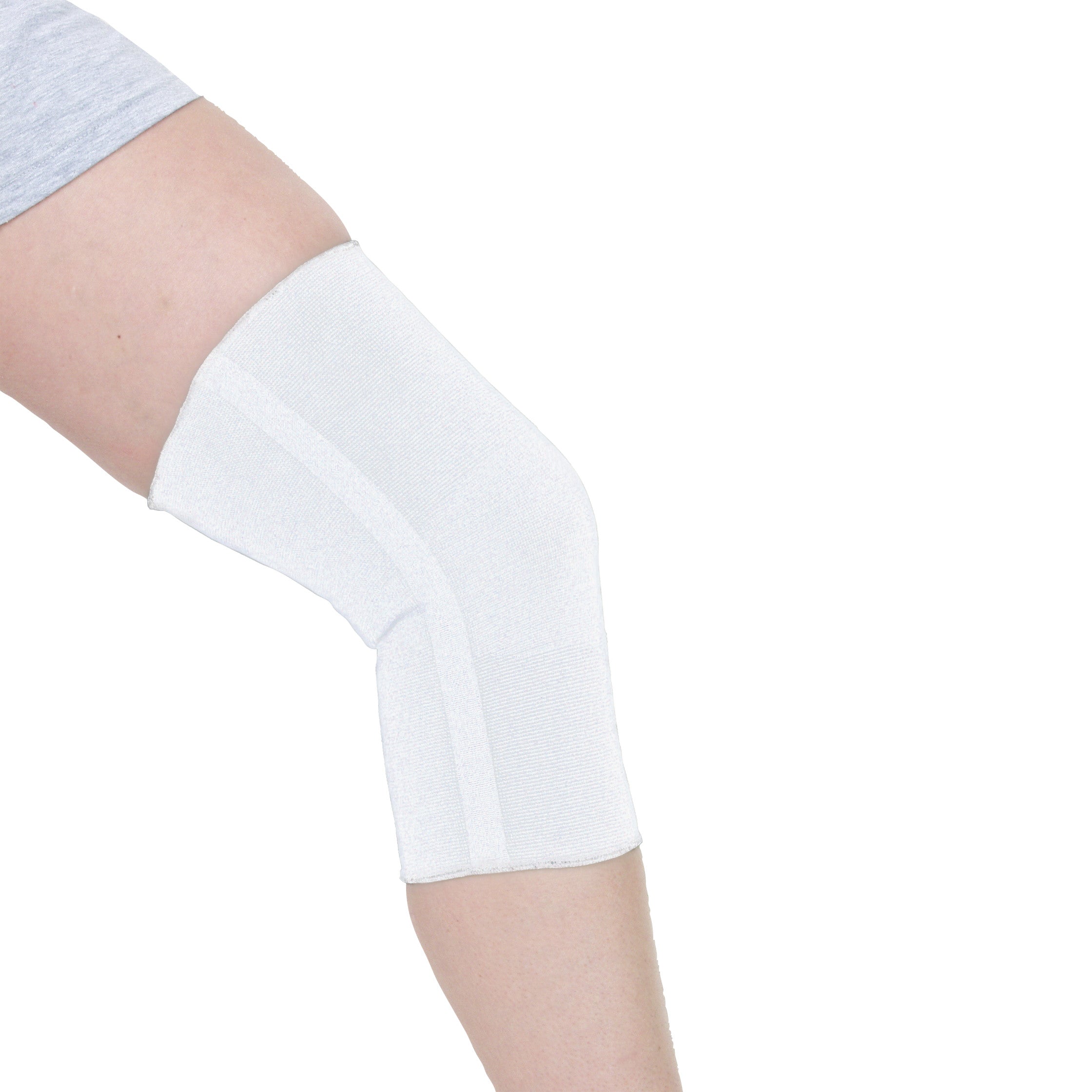 A white AliMed Knee Brace is worn on a person's bent knee, providing support above and below the joint.