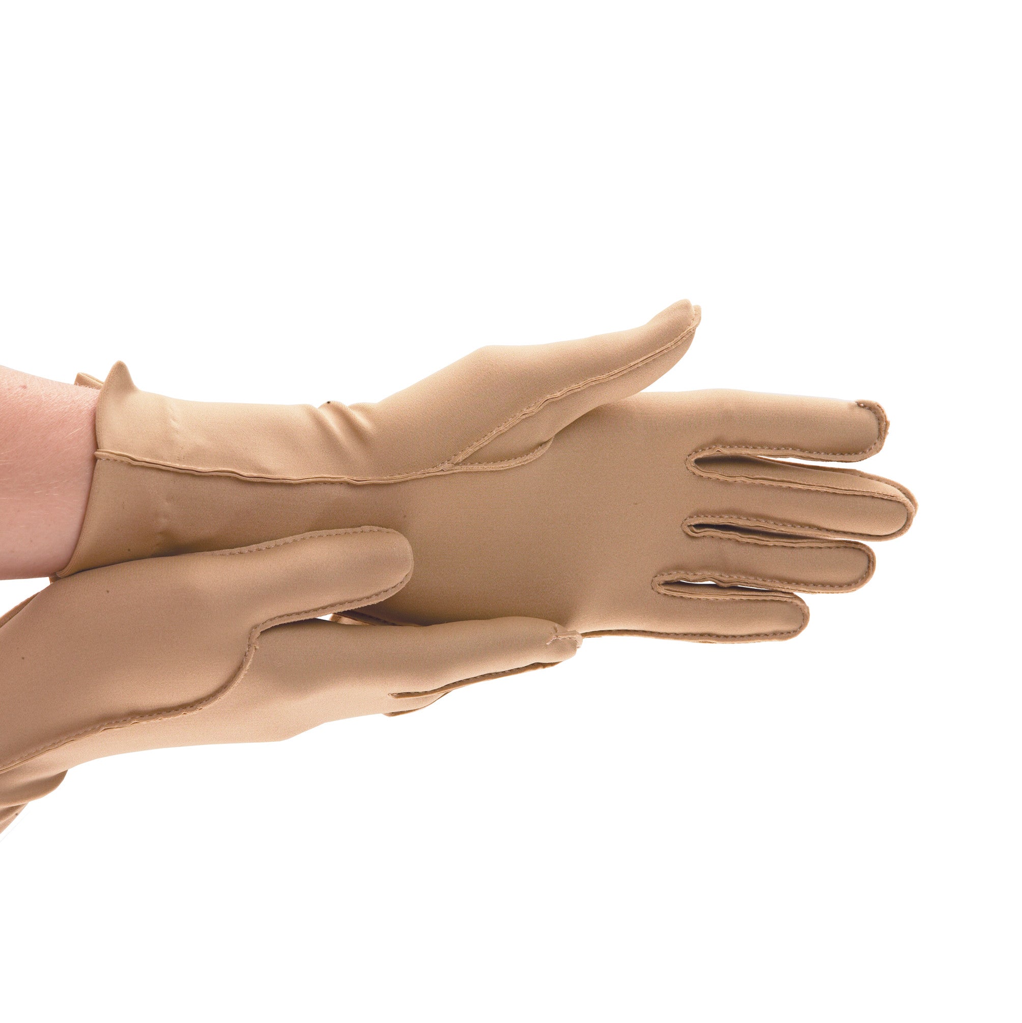 Two hands wearing Isotoner Therapeutic Compression Gloves in beige, with open fingertips and reinforced stitching.