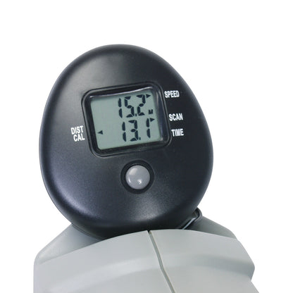 Close-up of an AliMed Magnetic Pedal Exerciser display, showing digital readings for distance and time on a black plastic casing.