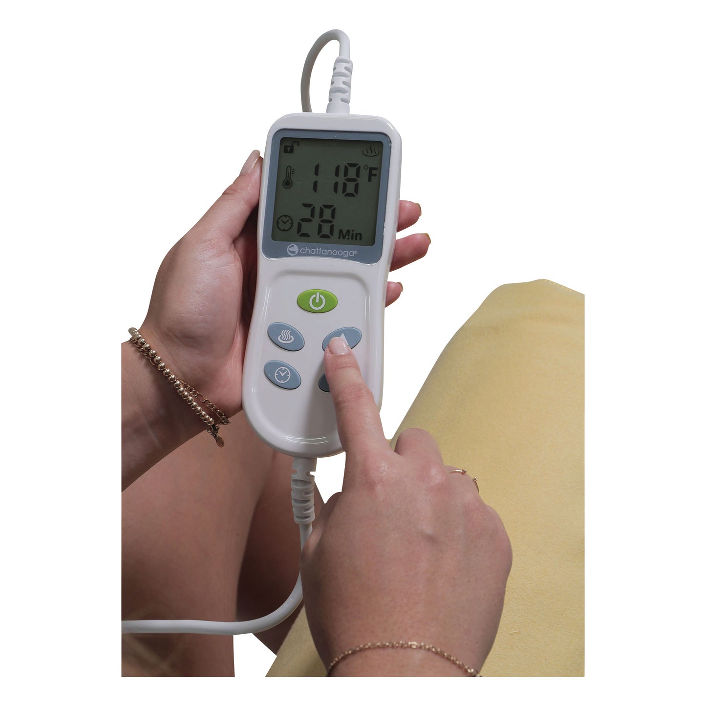 A person adjusts the Theratherm Automatic Moist Heat Pack, showing a display reading 118 1/2F and 20 minutes.