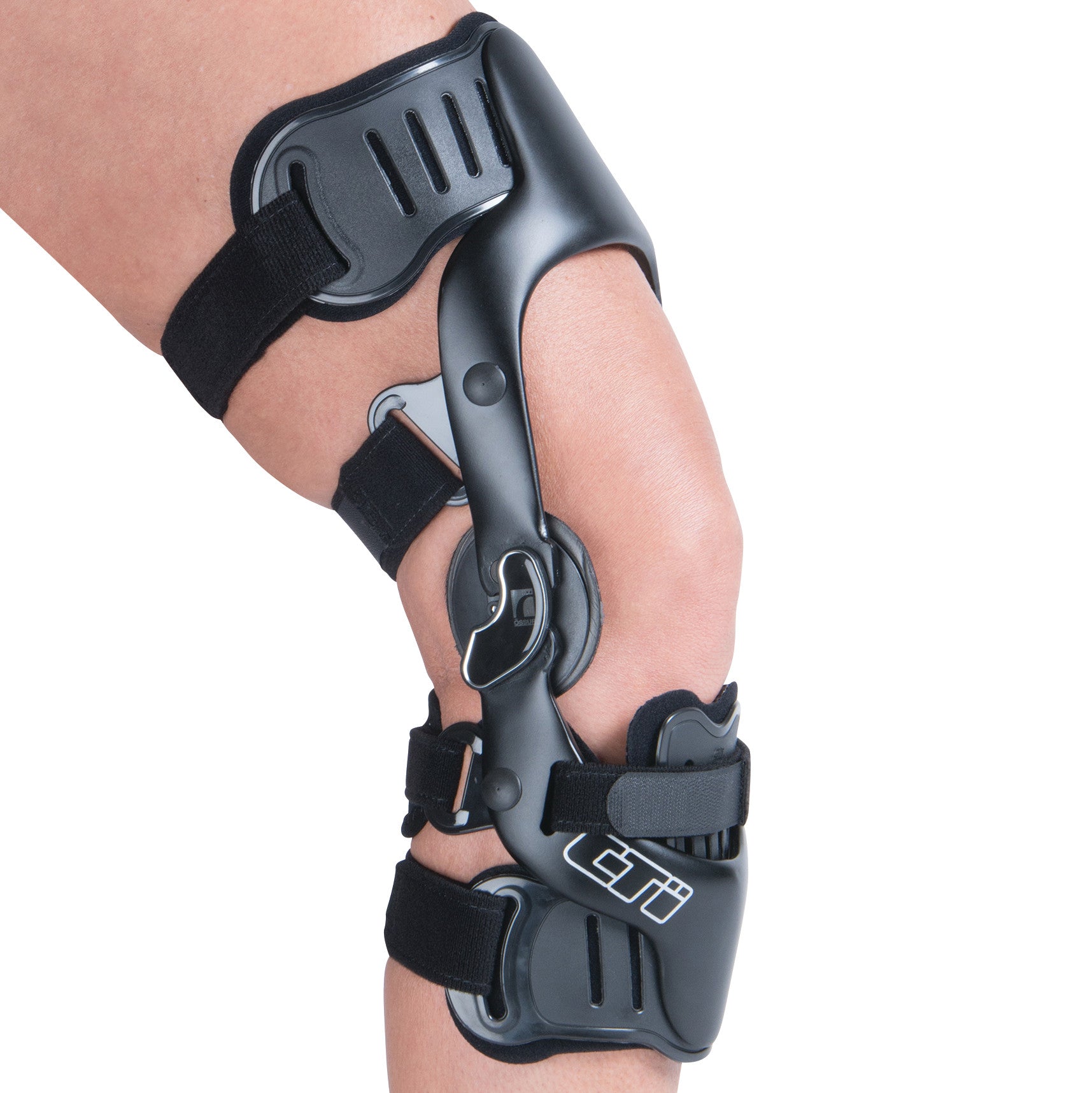 An Ossur CTi OTS Knee Brace on a leg. It features a black frame with adjustable straps for support.