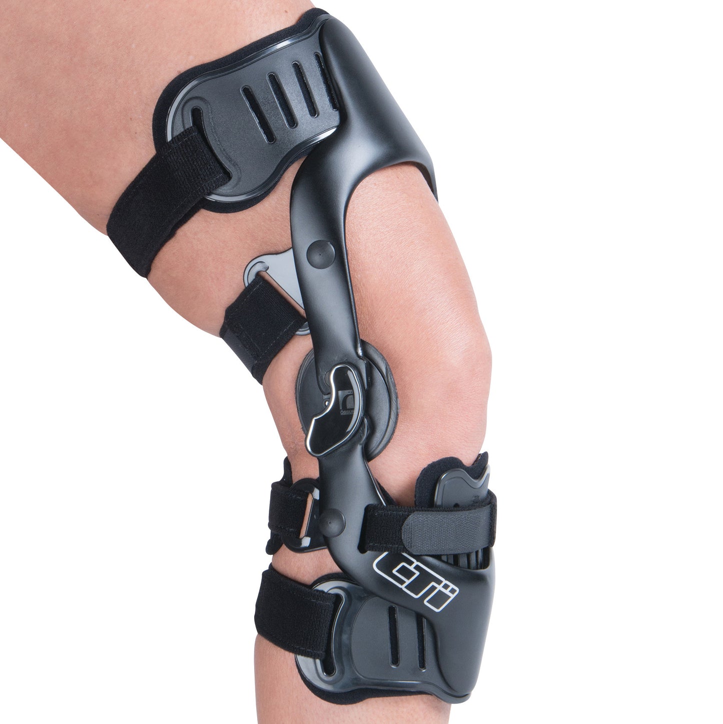 An Ossur CTi OTS Knee Brace on a leg. It features a black frame with adjustable straps for support.