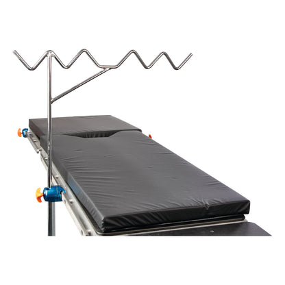 AliMed Standard Picket Fence Leg Prepper features a padded black surface with a zigzag metal rail for positioning.