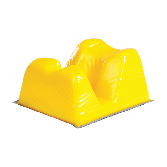 Yellow AliMed AliLite Prone Headrest with contoured design, shown from an angle on a flat surface.