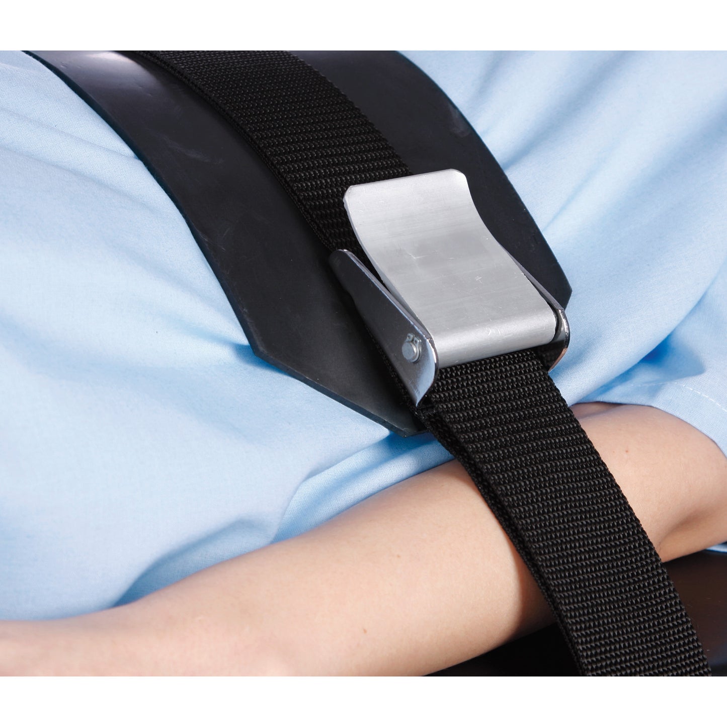 A person is secured with an AliMed Basic Mid-Panel Strap, featuring a black belt and silver buckle over a blue garment.