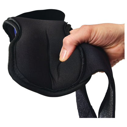 A hand holds the AliMed FREEDOM Dorsal PF Night Splint, showcasing its soft, black contoured design for foot support.